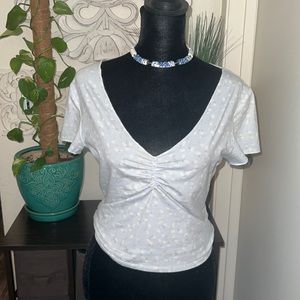 powder blue floral top.